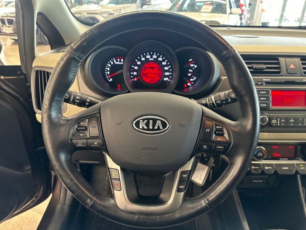 Kia Rio 2011 Ruskea (beige)