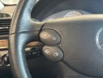Mercedes-Benz E 2009 Musta