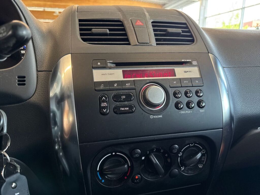 Suzuki SX4 2010 Oranssi