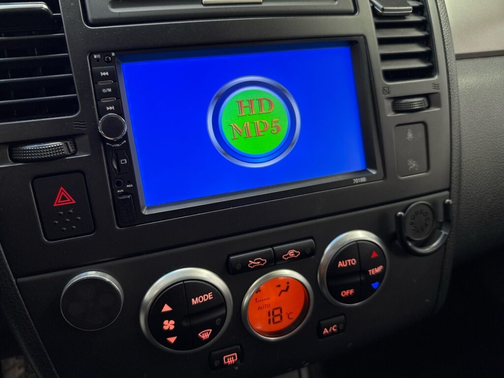 Nissan Tiida 2010 Hopea