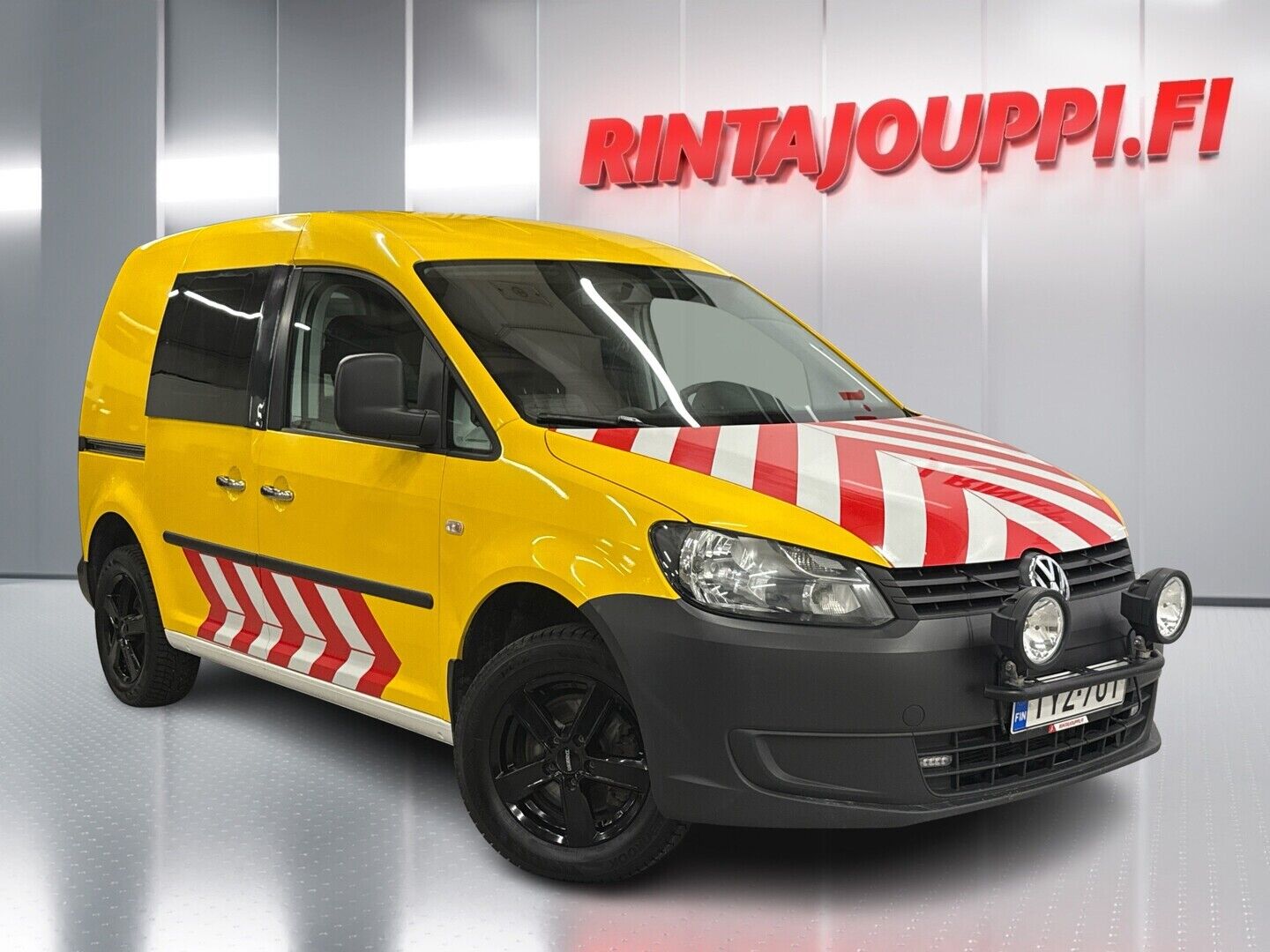 Valkoinen Volkswagen Caddy