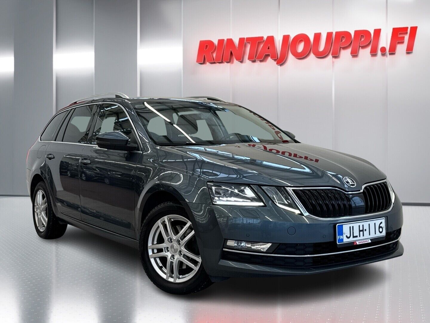 Harmaa Skoda Octavia