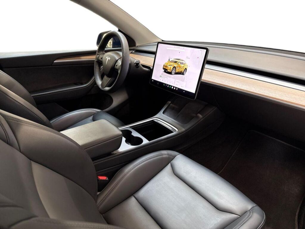 Tesla Model Y 2023 Sininen