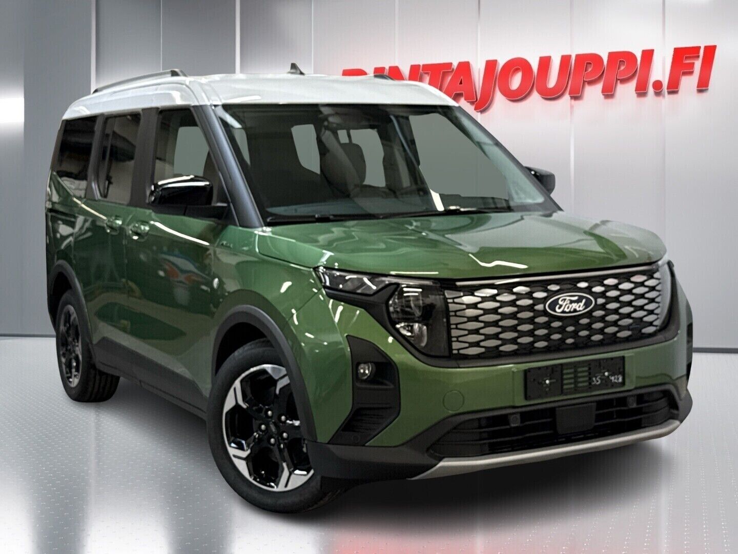 Vihreä Ford Tourneo Courier