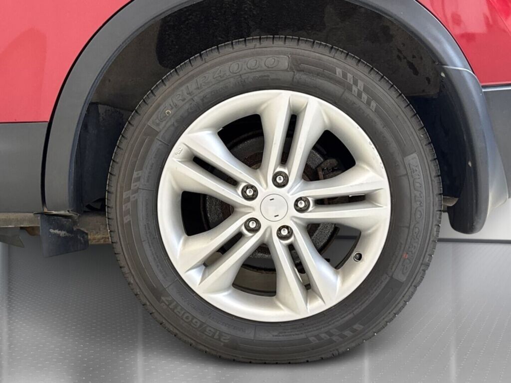 Nissan Qashqai+2 2012 Punainen