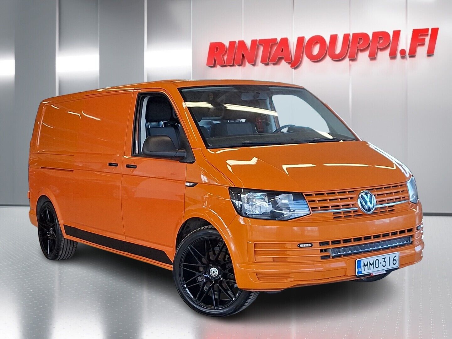 Oranssi Volkswagen Transporter