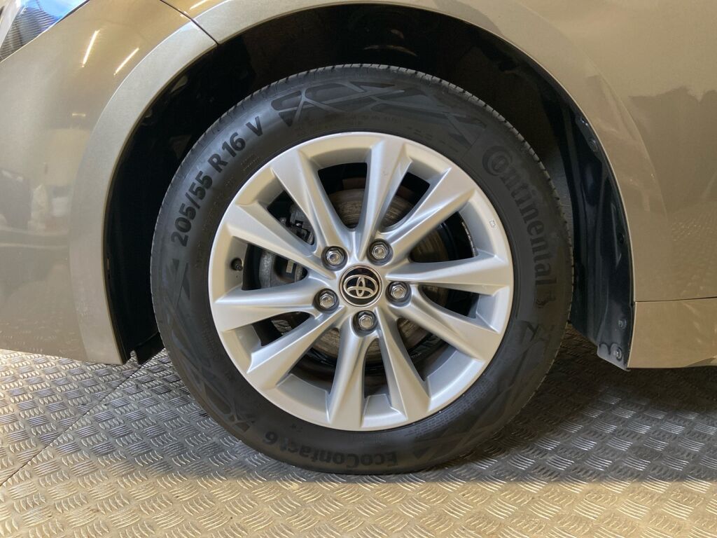 Toyota Corolla 2023 Ruskea (beige)