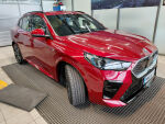 BMW iX2 2025 Punainen