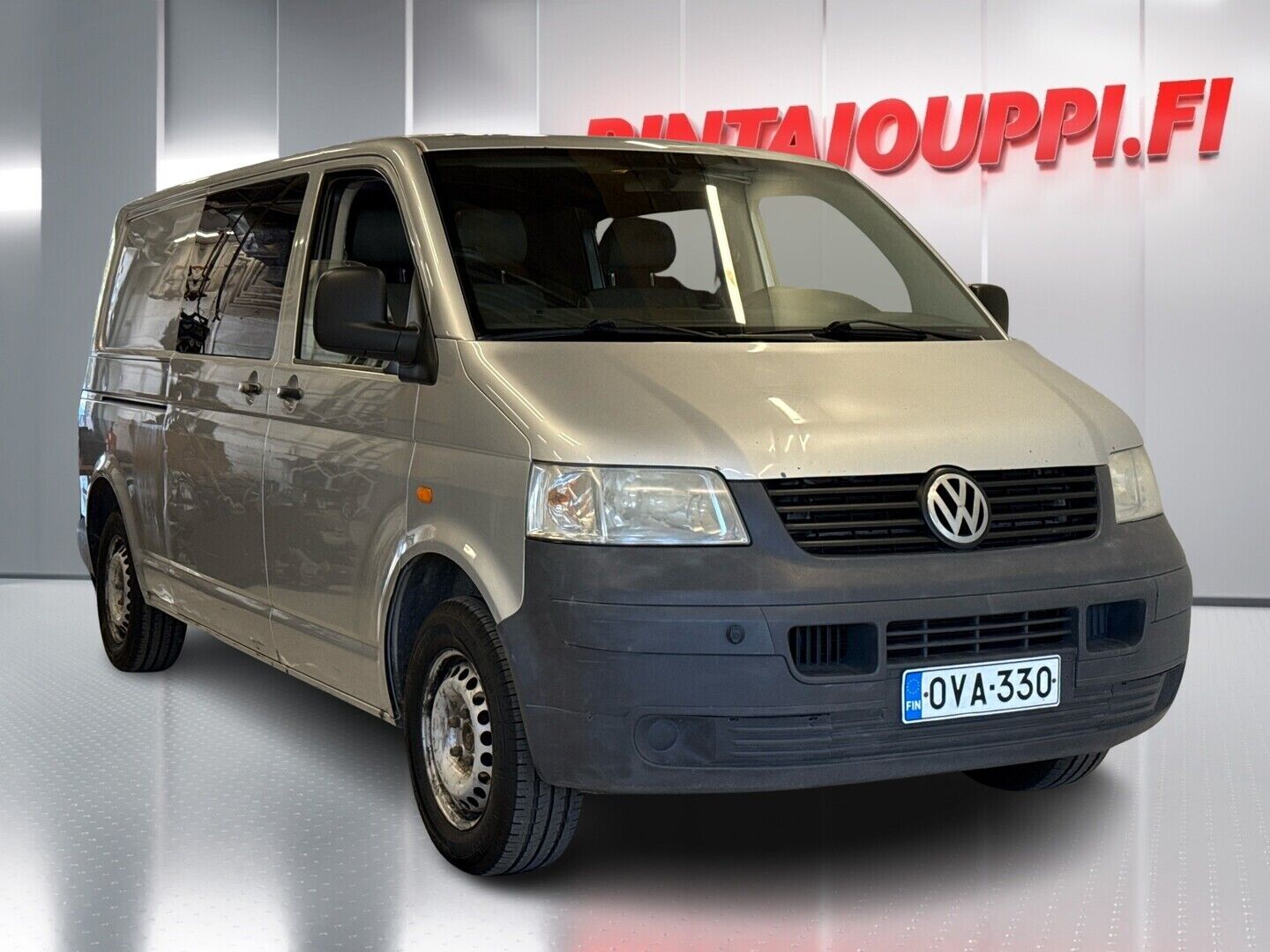 Harmaa Volkswagen Transporter