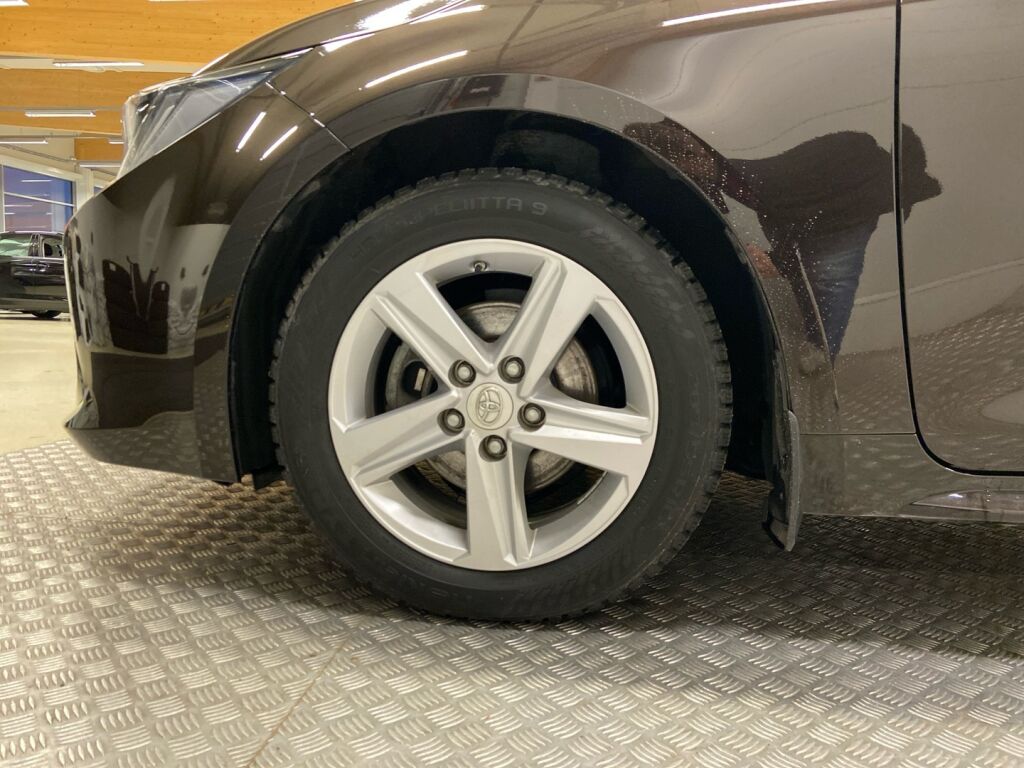 Toyota Corolla 2023 Ruskea (beige)