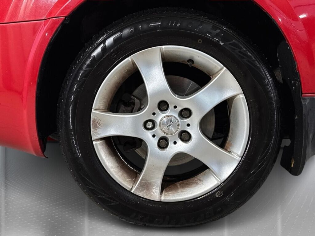Nissan Primera 2006 Punainen