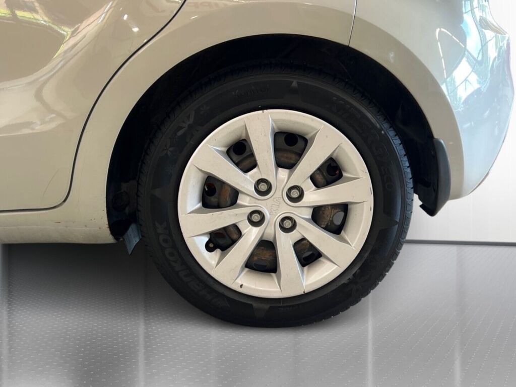 Kia Rio 2011 Ruskea (beige)