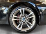 BMW 320 2012 Musta