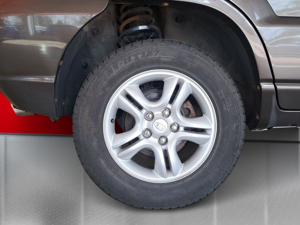 Kia Sportage 2006 Ruskea (beige)