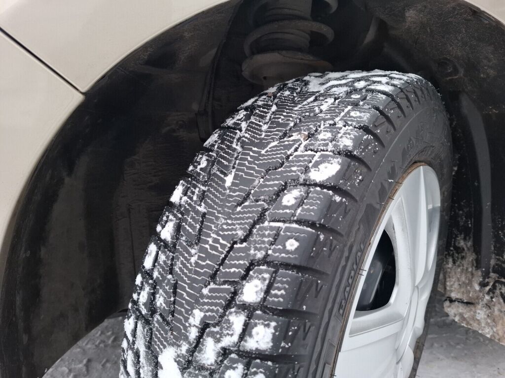 Nissan Tiida 2010 Hopea