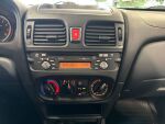 Nissan Almera 2006 Hopea